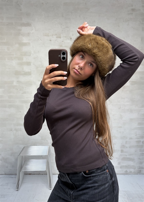 Tyra hat Brown Boii Studios